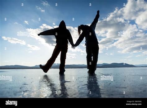 Friends Holding Hands Silhouette