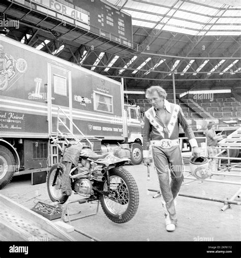 Stunt Rider Evel Knievel Checks Over His Harley Davidson Motorbike Before An Attempt To Jump