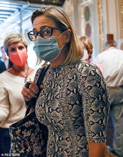 Relive Kyrsten Sinemas Bizarre Outfits As Shes Trolled Over Wacky