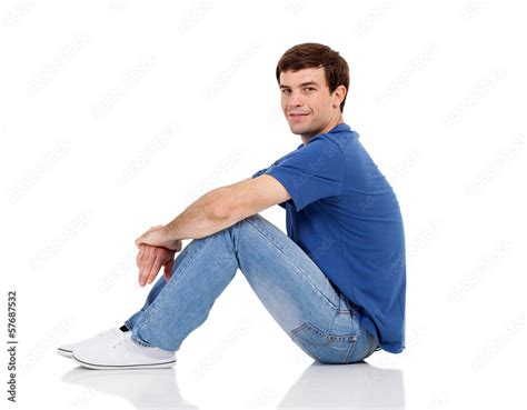 side view of man sitting on the floor Stock Photo | Adobe Stock