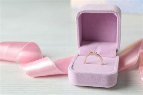 Premium Photo Concept Of Wedding Accessories With Wedding Ring Close Up