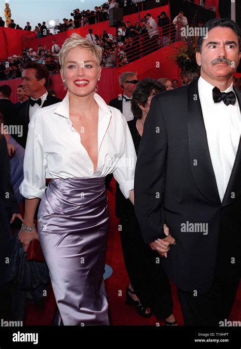 LOS ANGELES, CA - March 23, 1998: SHARON STONE & husband PHIL BRONSTEIN at the 70th Academy ...