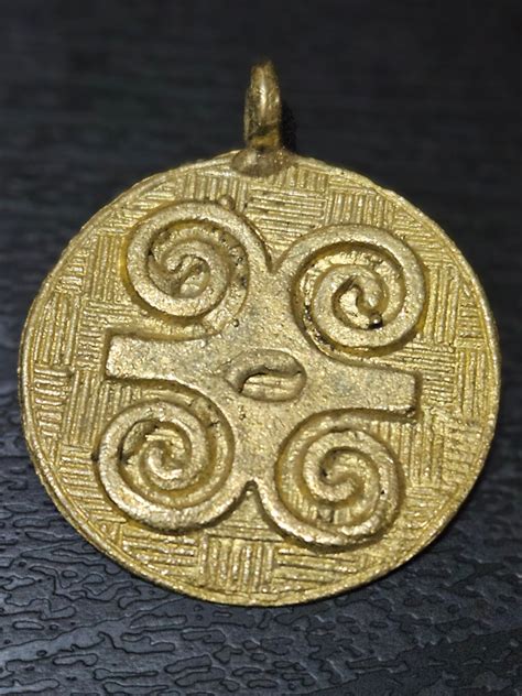 African Brass Pendant Crafted In Adinkra Symbol Humility And Strength