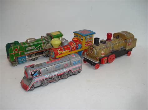 Bonhams Four Tinplate Toy Trains Japanese 1960s 4