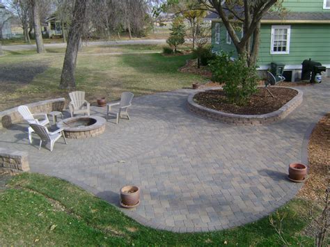 Paver Patio with Fire Pit & Integrated Plantscapes - Oasis Landscapes