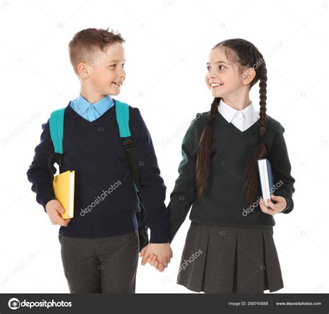 Portrait of cute children in school uniform on white background — Stock Photo © NewAfrica #268745888