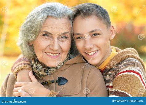 Grandmother And Grandson Hugging Stock Image Image Of Outdoors