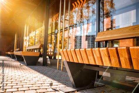 Stylish bus stop with wooden benches, modern architecture for the city Stock Photo | Adobe Stock