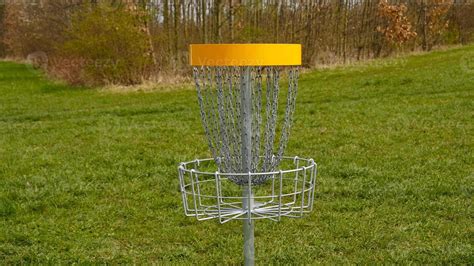 Disc Golf basket. Frisbee golf is sport and hobbie in outdoor park ...