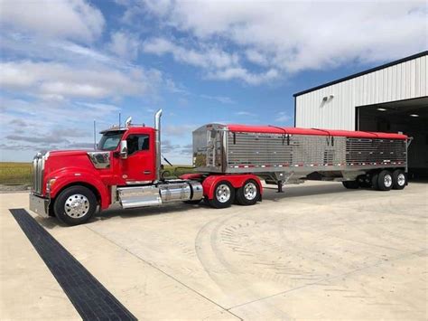 Customised Red Semi Truck with Large Trailer | Kenworth Trucks