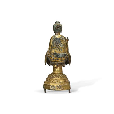 A Rare Gilt Bronze Figure Of A Seated Buddha