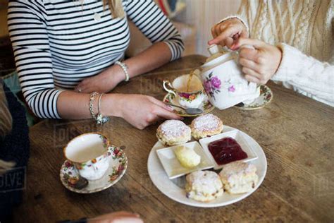 Table Set For Afternoon Tea In Café Stock Photo Dissolve