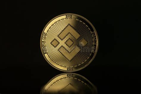 Binance BNB Crypto Coin Placed On Reflective Surface In The Dark