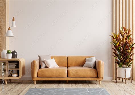 Interior Living Room Wall Mockup With Leather Sofa And Decor On White