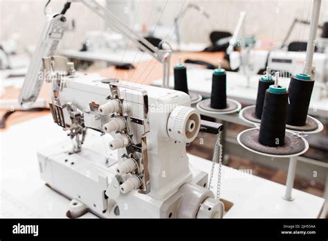 Professional Overlock Sewing Machine In Workshop Stock Photo Alamy