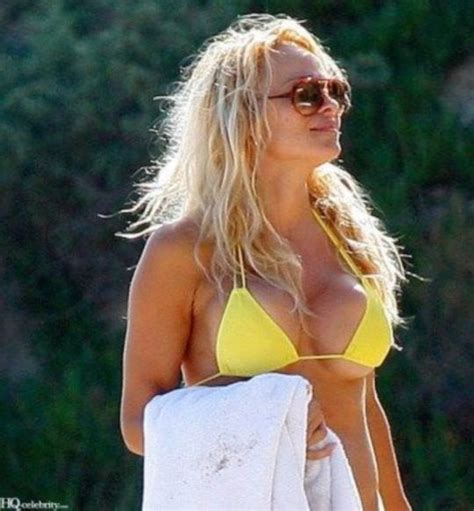 Pamela Anderson Yellow Bikini 2009 7 Pics NudeBase