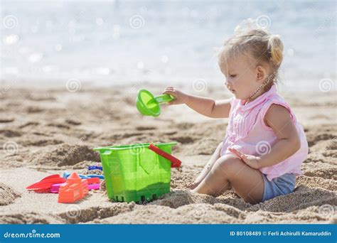 Little Girl Playing Sand Toys At The Beach Stock Image Image Of Beach