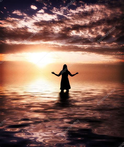 Woman Praising at sunrise — Stock Photo © kevron2002 #7769196