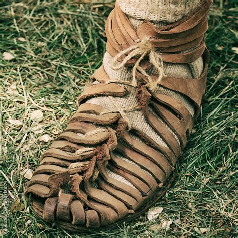 An Ancient Roman Man Legs In Caligae Leather Sandals Reconstruction Of