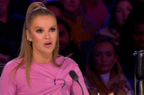 Amanda Holden strips totally naked in risqué video