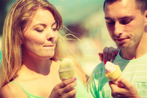 Man And Woman Eating Ice Cream On Beach Stock Image Image Of Couple