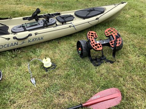 Ocean Kayak Trident Fishing Kayak With C Tug Trolley Carbon Paddle