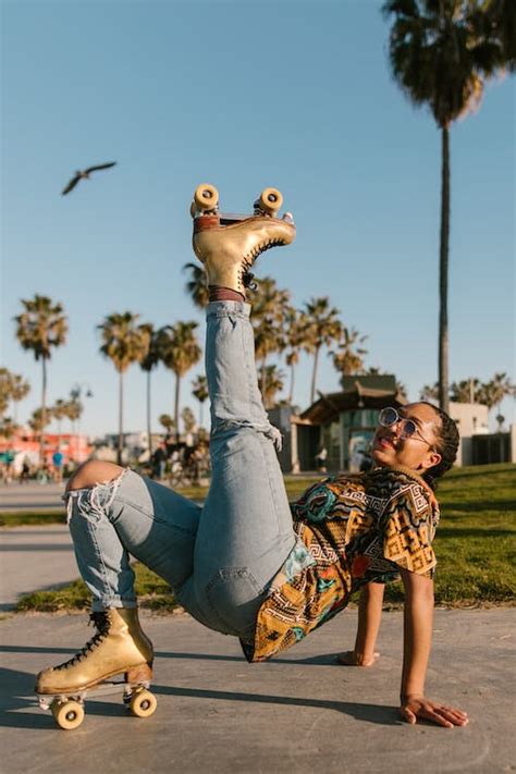 A Fashionable Woman Wearing Quad Roller Skates · Free Stock Photo