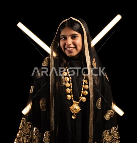 Portrait Of A Saudi Arabian Gulf Girl Wearing A Traditional Costume For