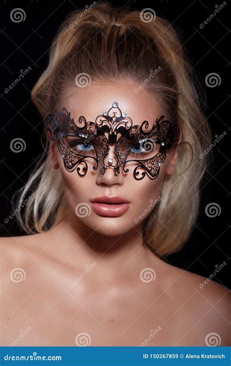 Model Woman In Venetian Masquerade Carnival Mask On Black Background