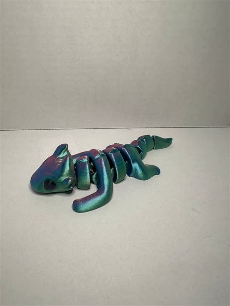 3d printed articulating Dragon by @Zou3d | MakerPlace by Michaels