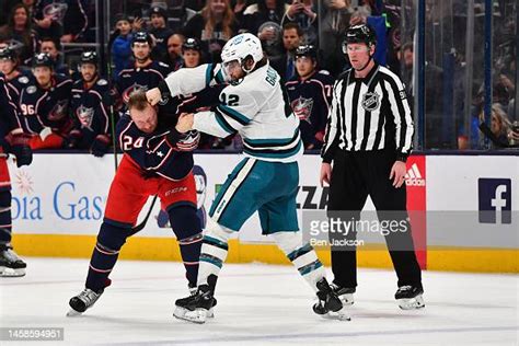 Jonah Gadjovich Of The San Jose Sharks Fights With Mathieu Olivier Of