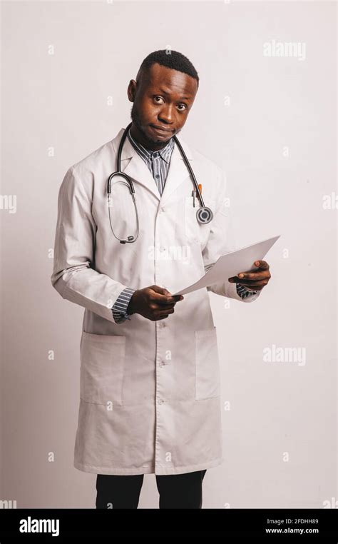 African-American black young doctor man isolated white background Stock ...