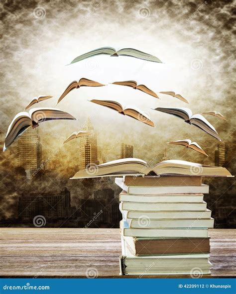 Abstract of Open Book on Stack and Flying Book To the Light Over Stock ...