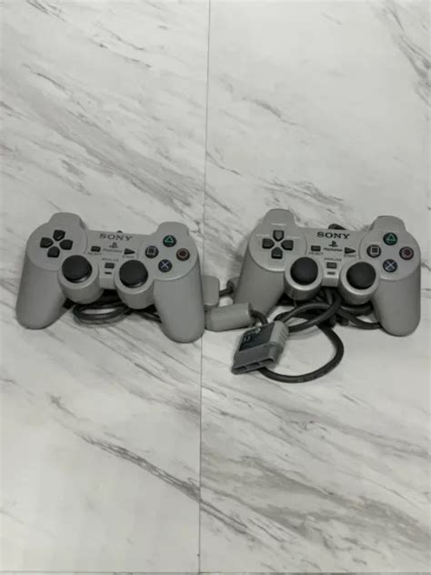 SONY PLAYSTATION PS1 PS2 Controller Dual Shock Lot Of 2 Grey SCPH 1200