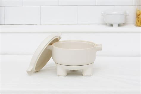 A White Bowl Sitting On Top Of A Counter