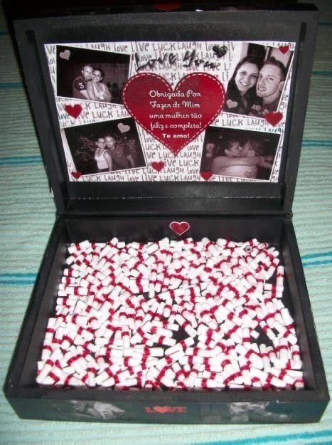 An Open Box Filled With Hearts And Pictures