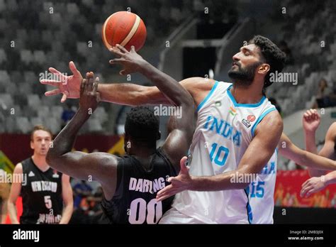 Indias Amritpal Singh Right Battles For A Rebound Against New