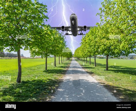 Lightning strike on an airplane during the landing Stock Photo - Alamy