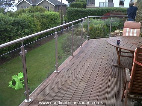 Stainless Steel And Glass Balustrade On A Decking Area Railings