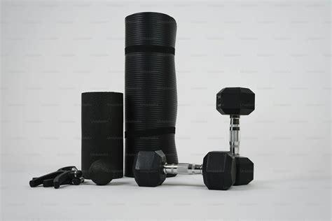 A pair of black dumbs and a pair of black dumbs photo – Dumbell Image