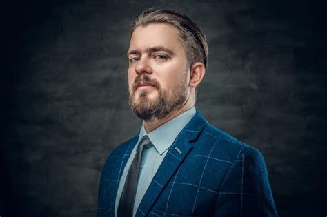 Free Photo Portrait Of An Elegant Bearded Man Dressed In A Wool