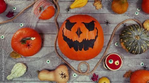 Pumpkin autumn halloween scenery on a wooden desk. Top view, tabletop ...