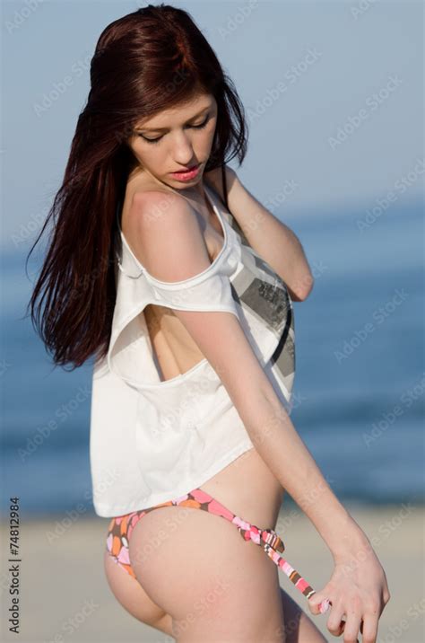 Sexy Woman Bikini And White Shirt On A Sand Beach Stock Photo Adobe Stock