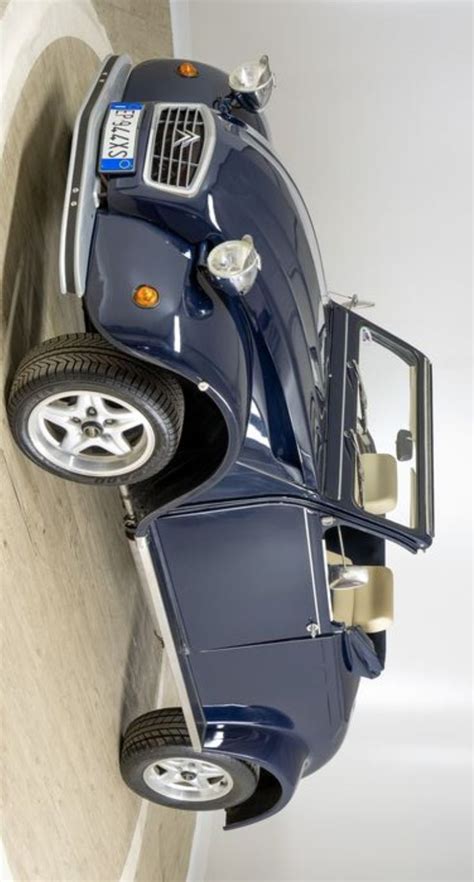 A Toy Car Is Sitting On Top Of A Wall