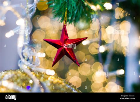 Christmas Background Of De Focused Lights With Decorated Tree Stock