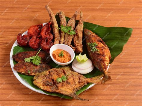 Premium Photo Indian Fish Platter Bangda Fish Fryprawns 65pomfret