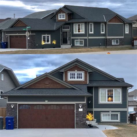 Craftsman Style Home with Darn/Navy Blue Siding and Wooden Accents