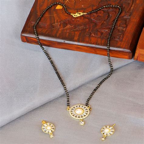 Crunchy Fashion Gold Plated American Diamond Studded Floral Mangalsutra Set