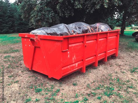 Large Waste Bin Construction Waste Dumpsters Being Full With Garbage