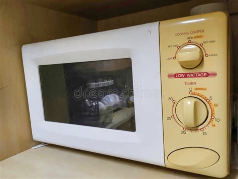 The Microwave Oven in the White Kitchen Stock Image - Image of ...